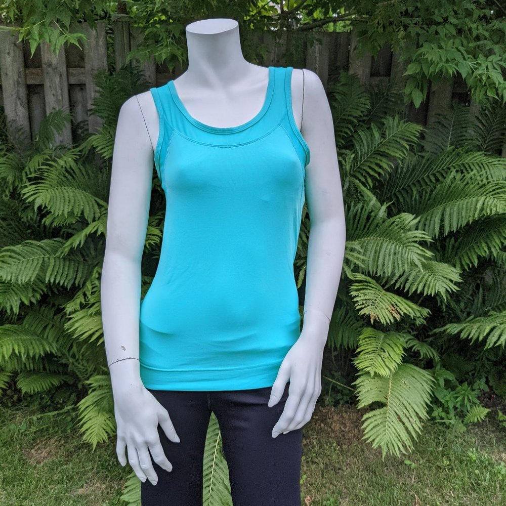 Athletic top with mesh inserts